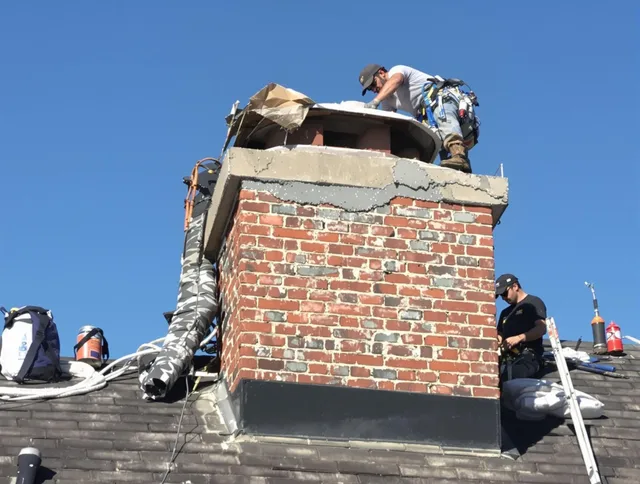 Diamond Bar Chimney Sweep installing a custom chimney crown in Diamond Bar, CA